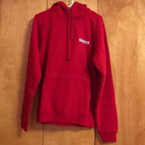 james charles red hoodie